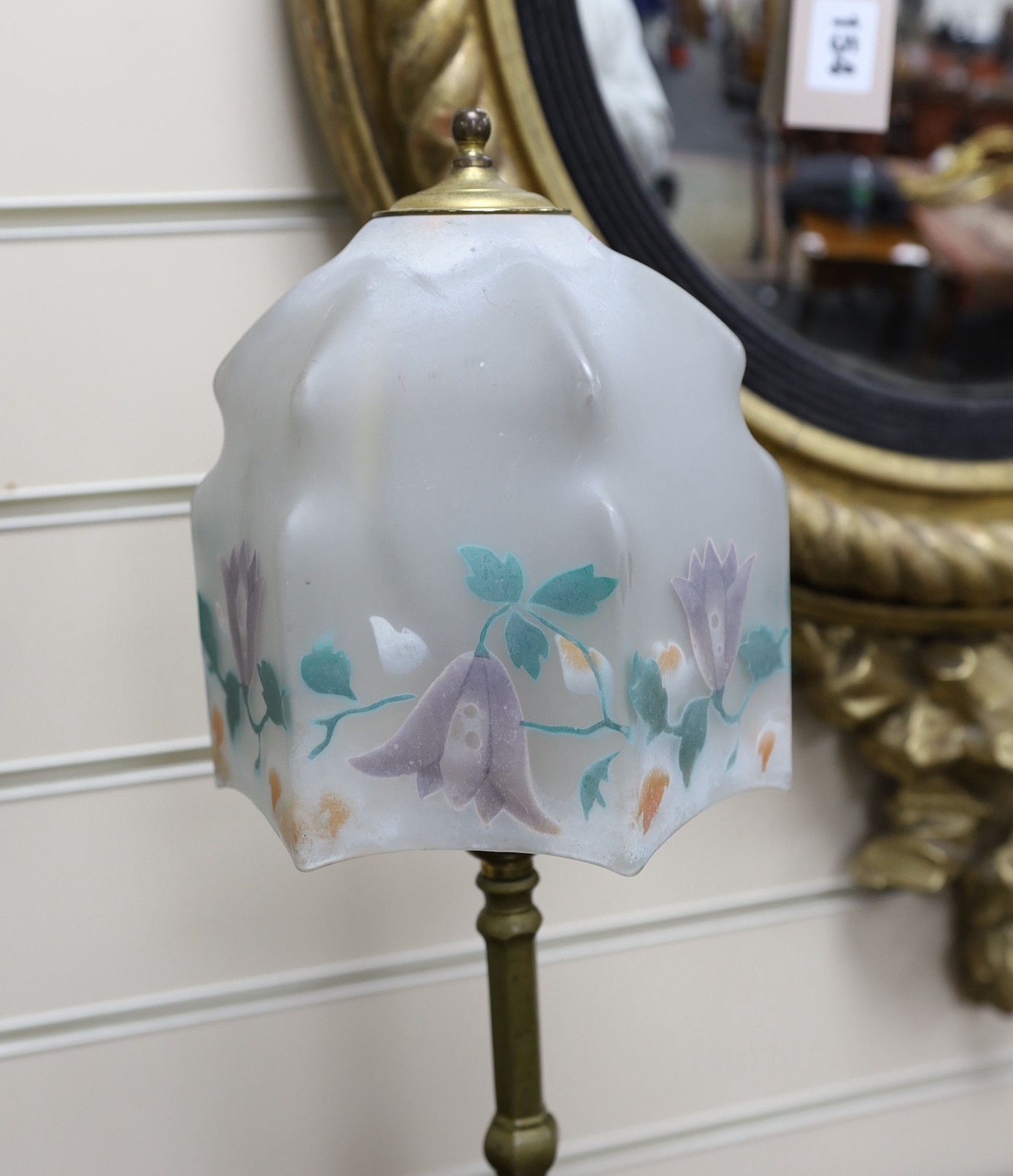 A brass Pullman lamp, glass shade